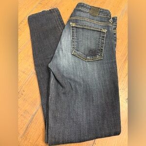 Vizcaino straight leg dark wash distressed woman’s jeans. Size 28. Made in USA.
